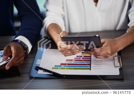 Team of people work together on company statistics. concept of teamwork and partnership. Team of people work together on company statistics. concept of teamwork and partnership. 96145778