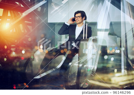 Traveler businessman with his smartphone ready to fly. Double exposure. Traveler businessman with his smartphone ready to fly. Double exposure. 96146296