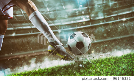 Football scene at night match with player ready to shoot the ball Football scene at night match with player ready to shoot the ball 96146321