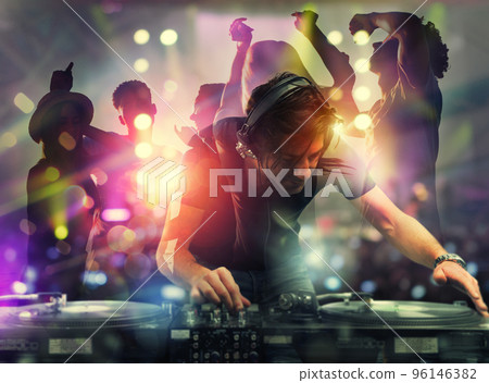 DJ playing music at the discotheque. Double exposure DJ playing music at the discotheque. Double exposure 96146382