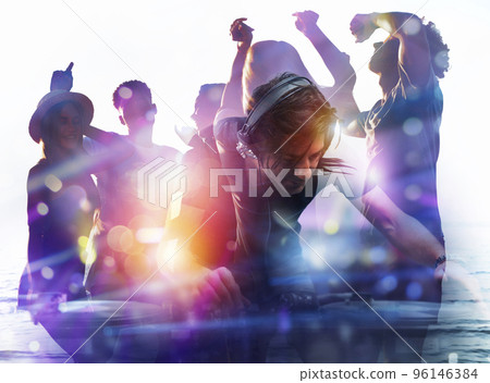 DJ playing music at the discotheque. Double exposure 96146384