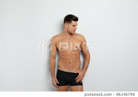 Handsome man in black underwear on white background 96146799