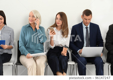 People waiting for job interview in office 96147247