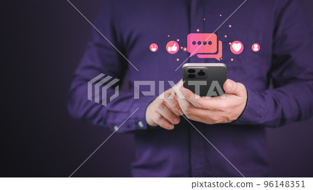 Young man using a mobile phone. Concept of living on vacation and playing social media on smartphone, Social media and digital online, chatting with friends online. 96148351