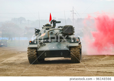 Type 74 tank of the Ground Self-Defense Force assaulting Type 74 tank of the Ground Self-Defense Force assaulting 96148566