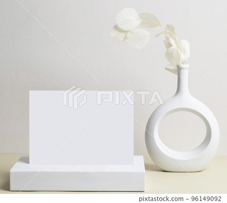 greeting card front view and dry flower in vase ceramic on table greeting card front view and dry flower in vase ceramic on table 96149092