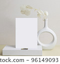 greeting card front view and dry flower in vase ceramic on table 96149093
