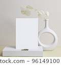 greeting card front view and dry flower in vase ceramic on table 96149100