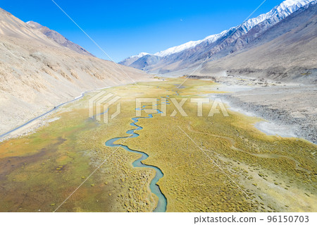 Landscape aerial view of mountains with river and green valley in Himalayas with blue sky in Nubra valley, Jammu and Kashmir, India.  96150703