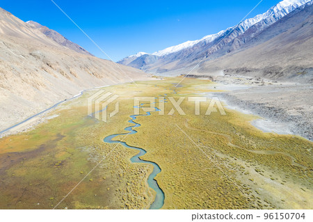Landscape aerial view of mountains with river and green valley in Himalayas with blue sky in Nubra valley, Jammu and Kashmir, India.  96150704