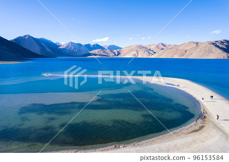 Aerial landscape of Pangong Lake and mountains with clear blue sky, it's a highest saline water lake in Himalayas range, landmarks and popular for tourist attractions in Leh, Ladakh, India, Asia Aerial landscape of Pangong Lake and mountains with clear blue sky, it's a highest saline water lake in Himalayas range, landmarks and popular for tourist attractions in Leh, Ladakh, India, Asia 96153584