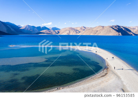 Aerial landscape of Pangong Lake and mountains with clear blue sky, it's a highest saline water lake in Himalayas range, landmarks and popular for tourist attractions in Leh, Ladakh, India, Asia Aerial landscape of Pangong Lake and mountains with clear blue sky, it's a highest saline water lake in Himalayas range, landmarks and popular for tourist attractions in Leh, Ladakh, India, Asia 96153585