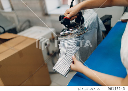Dry cleaning clothes. Clean cloth chemical process. Laundry industrial dry-cleaning 96157243