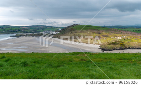Picturesque hills, seashore. Cloudy rainy weather. Landscapes along the Wild Atlantic Way. Nature of Northwestern Europe. Beautiful places of Ireland. 96158026