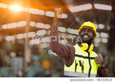 success black African male worker raised his fist in happy joyful. congratulate enjoy working and receive good welfare concept 96159015