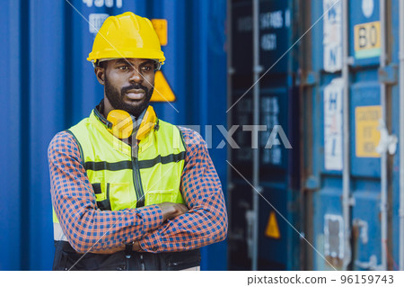 Logistics industry African black male engineer staff worker foreman at port container yard control loading cargo Logistics industry African black male engineer staff worker foreman at port container yard control loading cargo 96159743