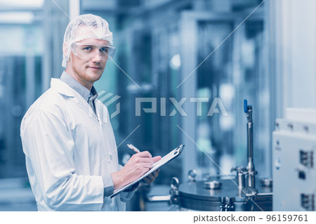 portrait medicine factory scientist worker work in Laboratory Plants Process. medical doctor working research in pharmaceutical industry looking smile. 96159761