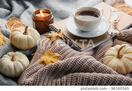 White pumpkins, coffee and autumn leaves White pumpkins, coffee and autumn leaves 96160569