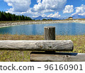 Beautiful view over a wooden fence between wooden fence posts 96160901