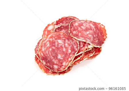 Slices of salami sausage on a white background Slices of salami sausage on a white background 96161085