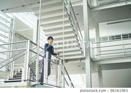 Suit style man looking far away 96161963