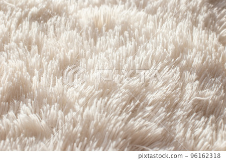 Texture of fluffy white artificial plaid, close up Texture of fluffy white artificial plaid, close up 96162318