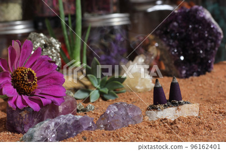 Amethyst Crystals and Chakra Stones on Australian Red Sand. Meditation Table 96162401
