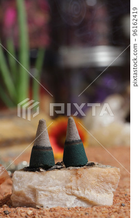 Chakra Stones With Aloe Vera and Incense Cones on Australian Red Sand 96162419