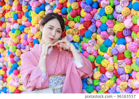Beautiful kimono woman posing at a tourist attraction in Kyoto Beautiful kimono woman posing at a tourist attraction in Kyoto 96163557