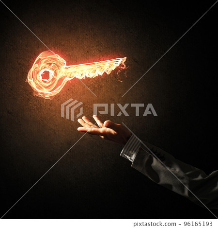 Concept of partnership and cooperation presented by fire glowing key icon 96165193