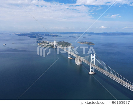 Aerial photograph by drone of the blue sky and the whole view of the Seto Ohashi Bridge 96165957