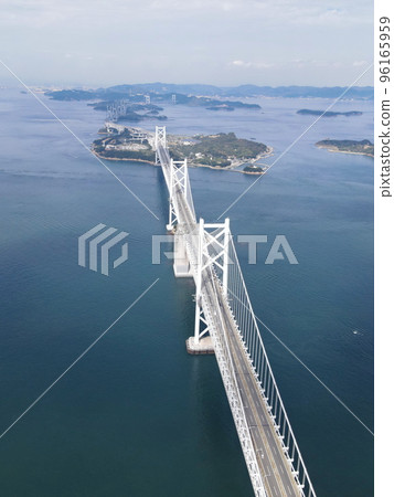 Aerial photograph by drone of the blue sky and the whole view of the Seto Ohashi Bridge 96165959