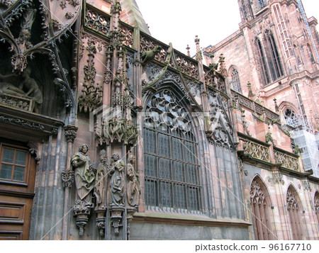main cathedral of Strasbourg France. Romanesque and gothic architecture style. Most famous Catholic cathedrals. design details, stone carving, statues, columns. April 2009. 96167710