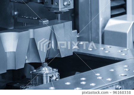 The wire EDM machine cutting the mold insert parts. 96168338
