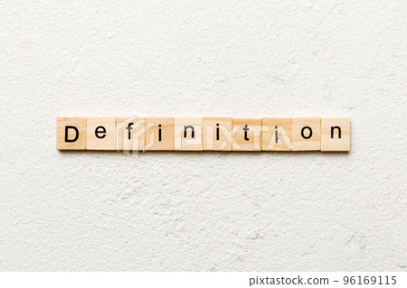Definition word written on wood block. Definition text on cement table for your desing, concept 96169115