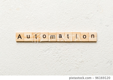 Automation word written on wood block. Automation text on cement table for your desing, concept Automation word written on wood block. Automation text on cement table for your desing, concept 96169120