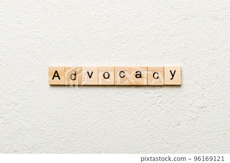 ADVOCACY word written on wood block. ADVOCACY text on cement table for your desing, concept ADVOCACY word written on wood block. ADVOCACY text on cement table for your desing, concept 96169121