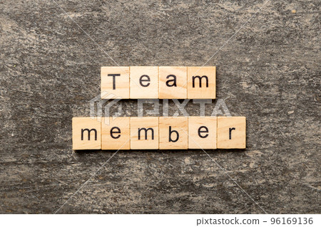 Team member word written on wood block. Team member text on table, concept 96169136