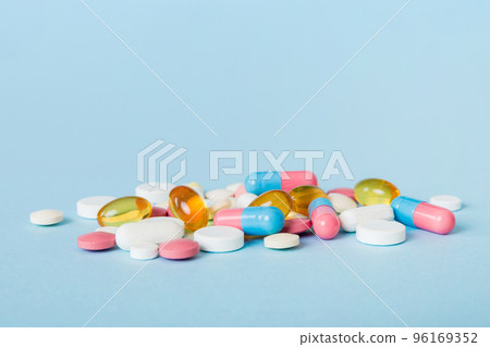 Many different colorful medication and pills perspective view. Set of many pills on colored background Many different colorful medication and pills perspective view. Set of many pills on colored background 96169352