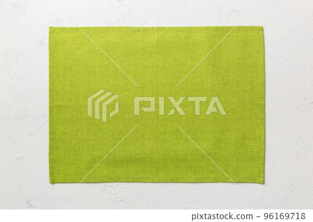 Top view of green tablecloth for food on cement background. Empty space for your design 96169718