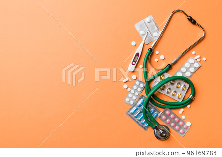 Medical background. Many different various medicine tablets or pills on the table with stethoscope. Close up. Healthcare pharmacy and medicine concept 96169783