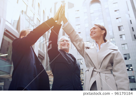 Business people putting their hands together. Concept of teamwork and partnership 96170184