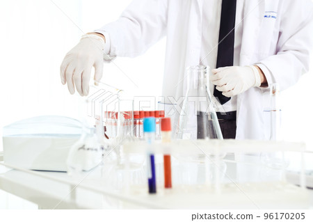 group of scientists working at the laboratory Laboratory concept with caucasian male chemist. group of scientists working at the laboratory Laboratory concept with caucasian male chemist. 96170205