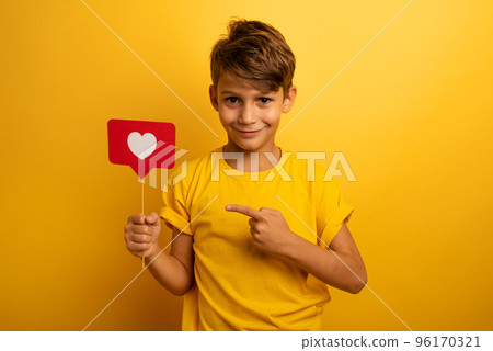 Child is happy because receives hearts on social network 96170321