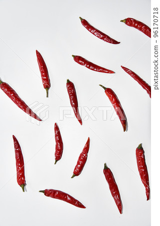 Red hot capsicum on a white background. Red pepper close-up. Red hot capsicum on a white background. Red pepper close-up. 96170718