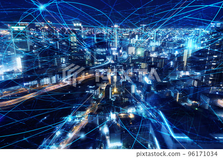 Fast internet connection in the city at night. Concept of technology and innovation Fast internet connection in the city at night. Concept of technology and innovation 96171034