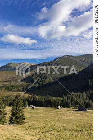 Panoramic view of Tatra Mountains. The Khokholovska valley in the Tatras near Zakopane. View of mountain peaks in autumn time Panoramic view of Tatra Mountains. The Khokholovska valley in the Tatras near Zakopane. View of mountain peaks in autumn time 96172276
