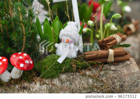 Christmas composition with hyacinths and snowman in a pot Christmas composition with hyacinths and snowman in a pot 96173312