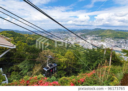 Nagasaki Prefecture / Fresh green cityscape and ropeway seen from Mt. Inasa (park) 96173765