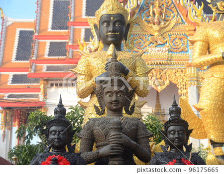 Front view of Thao Werasuwan black color at Chulamani Temple, Samut Songkhram Province. Thailand Front view of Thao Werasuwan black color at Chulamani Temple, Samut Songkhram Province. Thailand 96175665